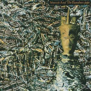 Albumcover mit abstrakten Mustern und einer statuenartigen Figur.