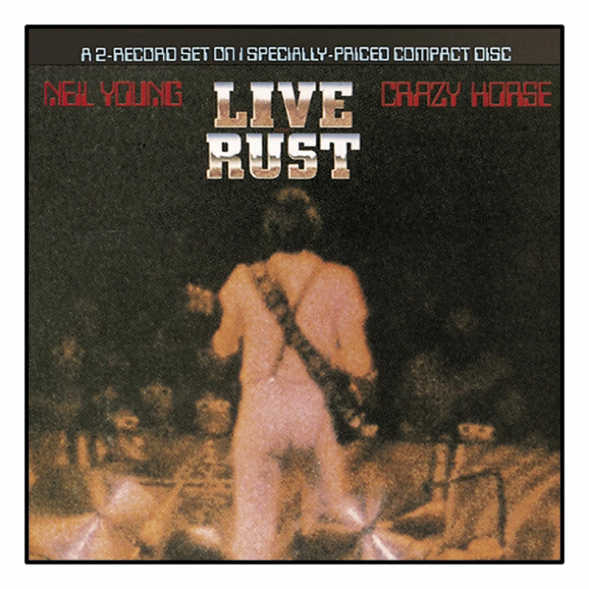 Albumcover für 'Live Rust' von Neil Young and Crazy Horse. Zeigt eine Figur auf der Bühne.