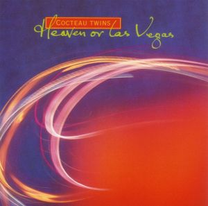 Albumcover mit abstraktem Design in Orange, Rot und Weiß, mit Cocteau Twins-Titel.