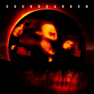 Albumcover von Soundgarden. Eine rote sonnenähnliche Figur mit verschwommenen Gesichtern in der Mitte.
