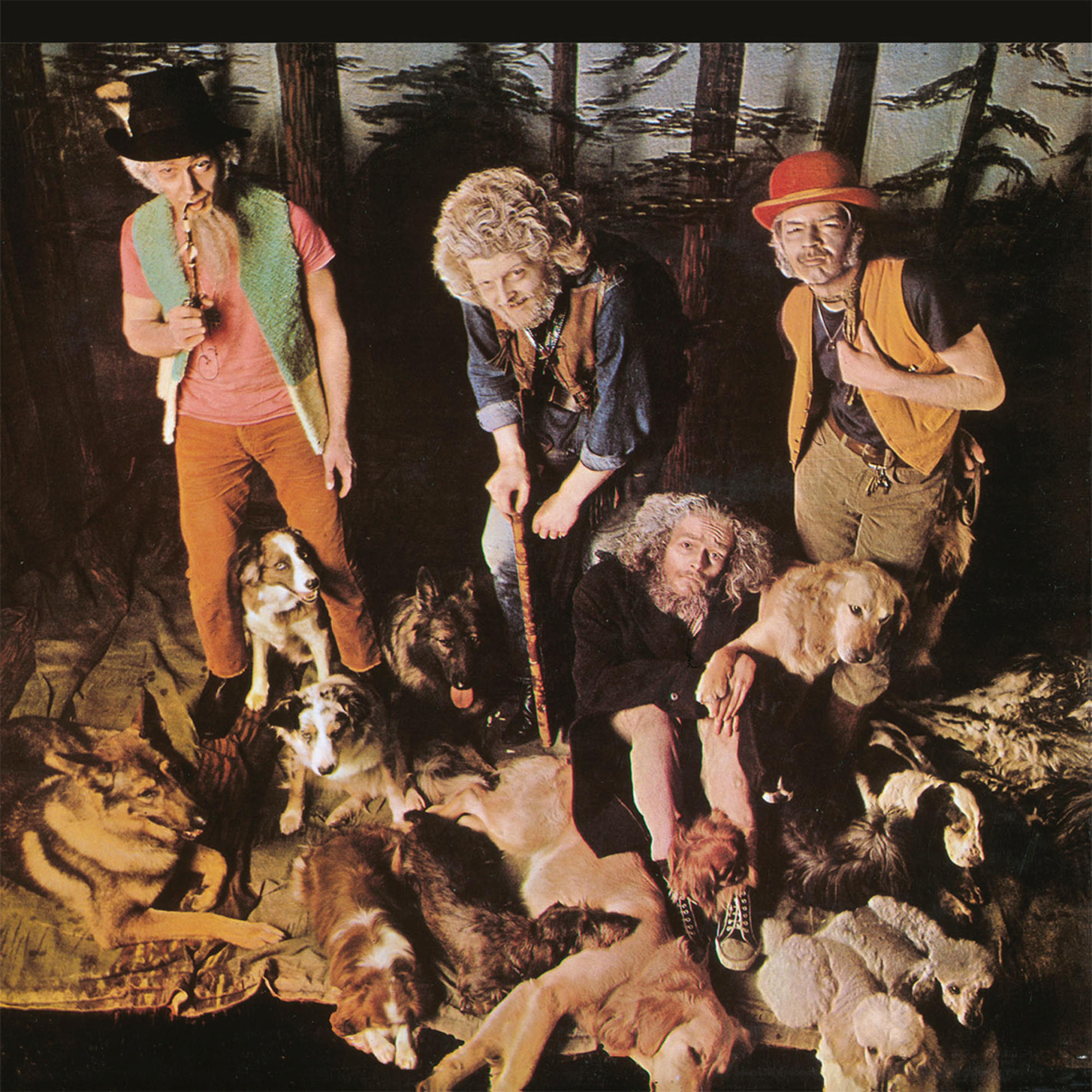 Albumcover. Drei Männer mit Hunden in einer Waldlandschaft. Männer sind rustikal gekleidet.
