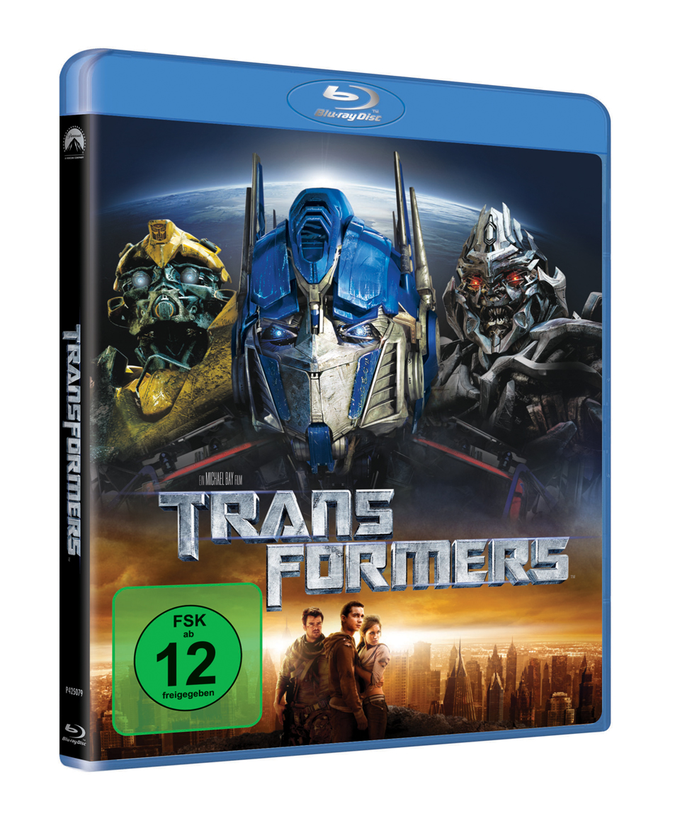 Transformers Blu-ray-Cover. Roboter mit Stadtkulisse und Menschen im Vordergrund.
