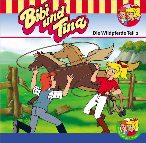 Bibi und Tina Cartoon-Cover mit Pferden und zwei Mädchen. Brauner Holzzaun im Hintergrund.