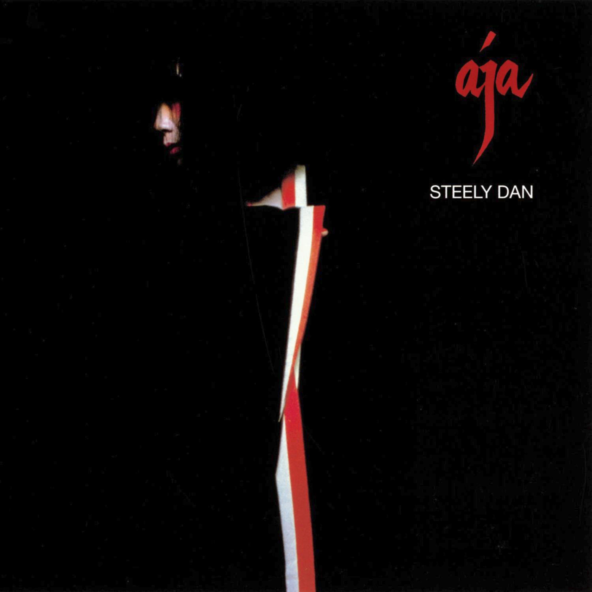 Albumhoes voor 'Aja' van Steely Dan. Een vrouwengezicht en een rode en witte lijn.