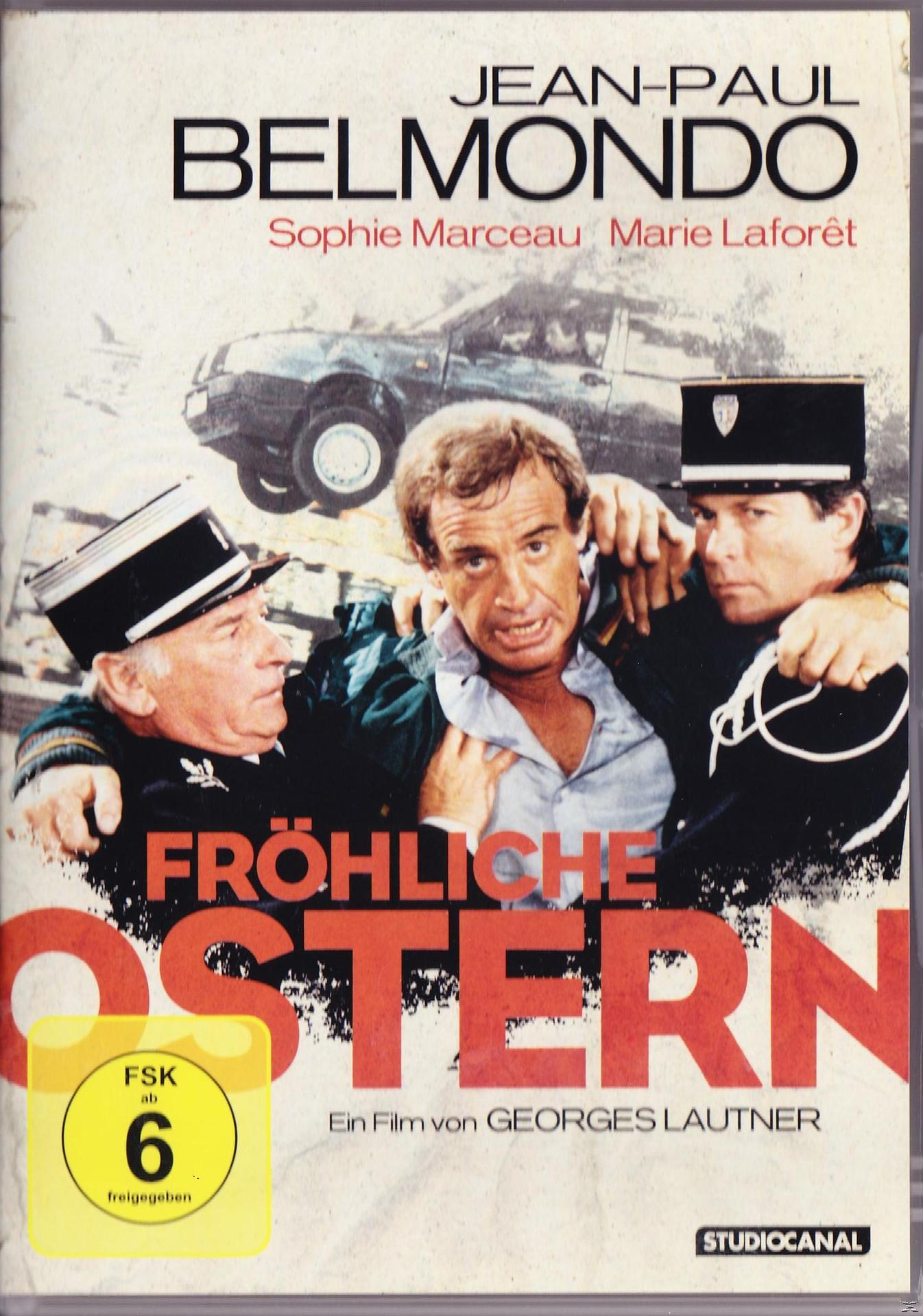 DVD-Cover. Jean-Paul Belmondo in der Mitte, mit zwei Beamten. Autounfall im Hintergrund.
