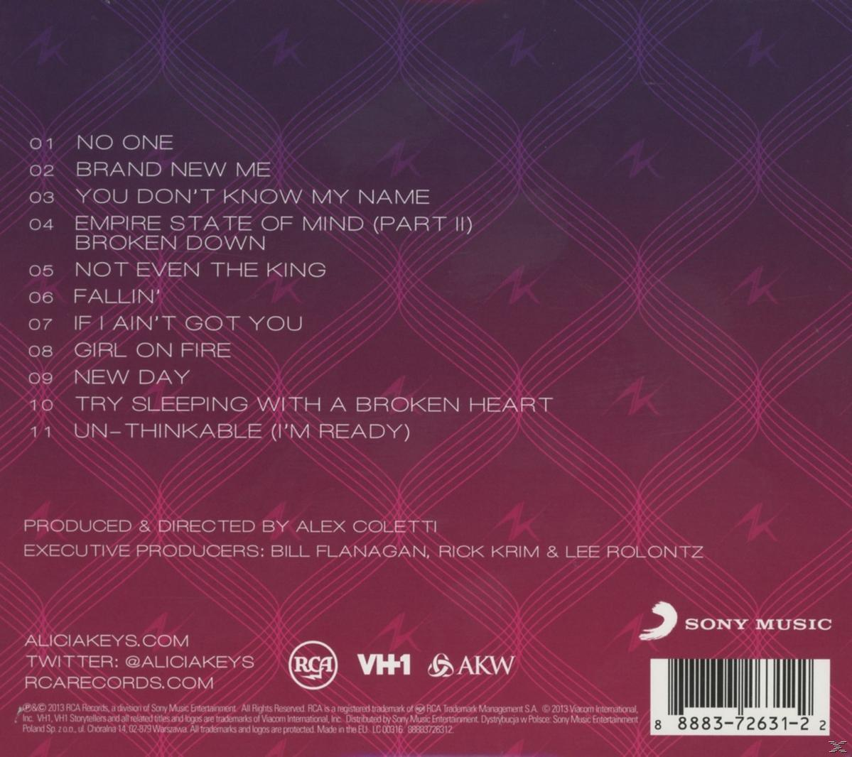 Album-Rückseite mit Songtiteln und Namen. Lila und weißer Text auf lila Hintergrund.