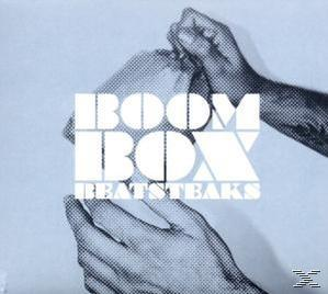 Albumcover mit Händen, weißem Text 'BOOMBOX' und 'BEATSTEAKS' auf blauem Hintergrund.