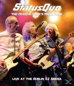 Albumcover für Status Quo, vier Bandmitglieder auf der Bühne.