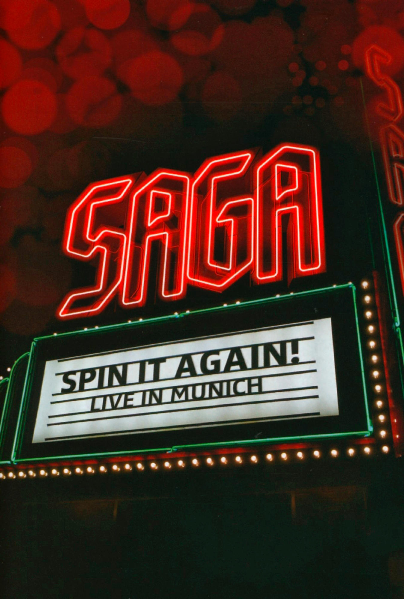 Neon-Schild: SAGA, darunter SPIN IT AGAIN! LIVE IN MÜNCHEN.