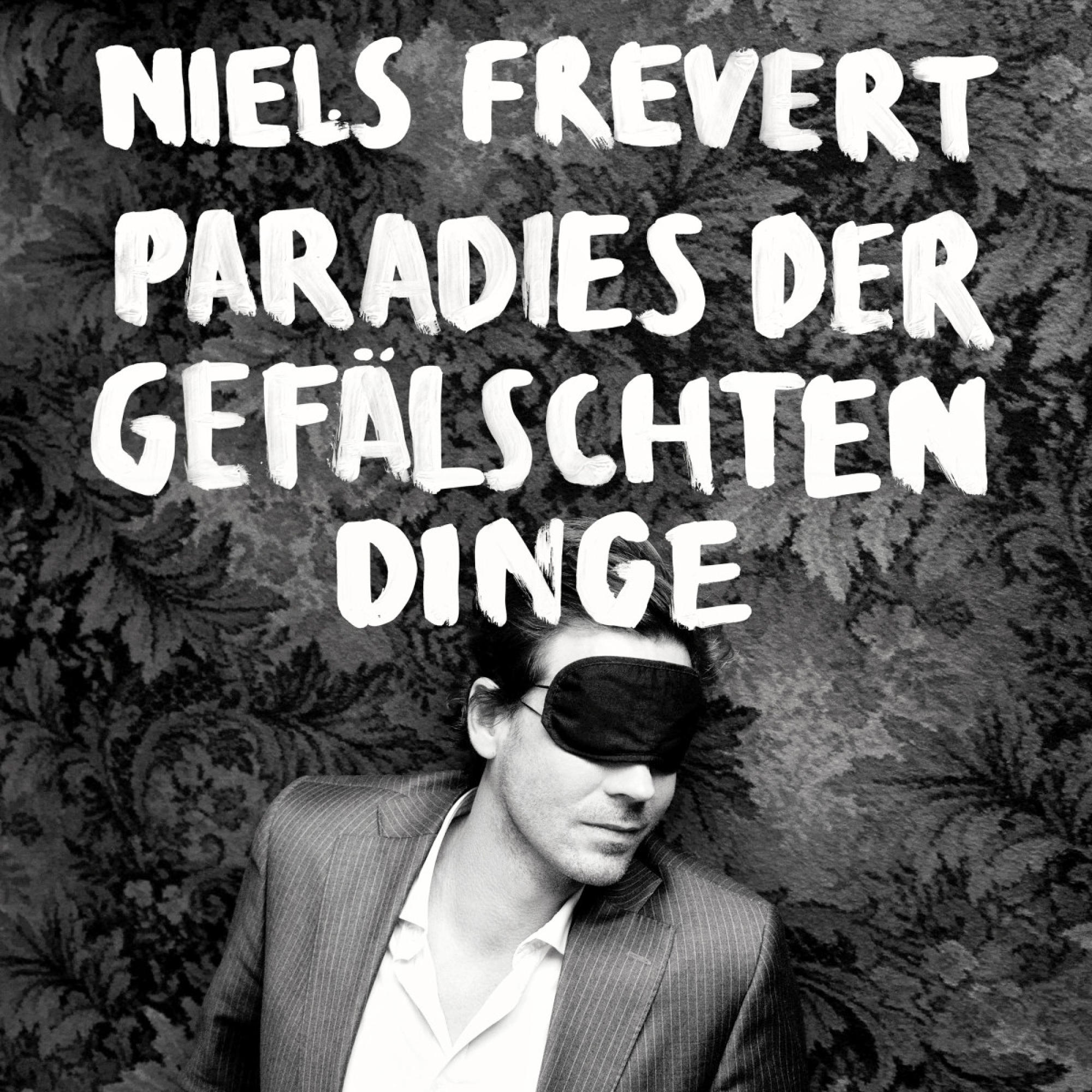 Albumcover mit dem Text „Niels Frevert“ und einem Mann mit Augenbinde.