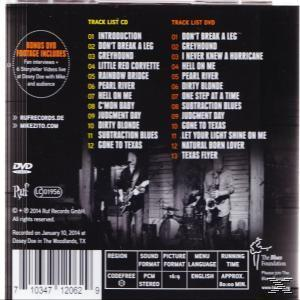 CD-Rückseite mit Silhouetten der Bandmitglieder, Titelliste und Credits in Schwarzweiß.
