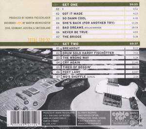 CD-Rückseite: Titelliste und Gitarren. Text und ein Barcode.