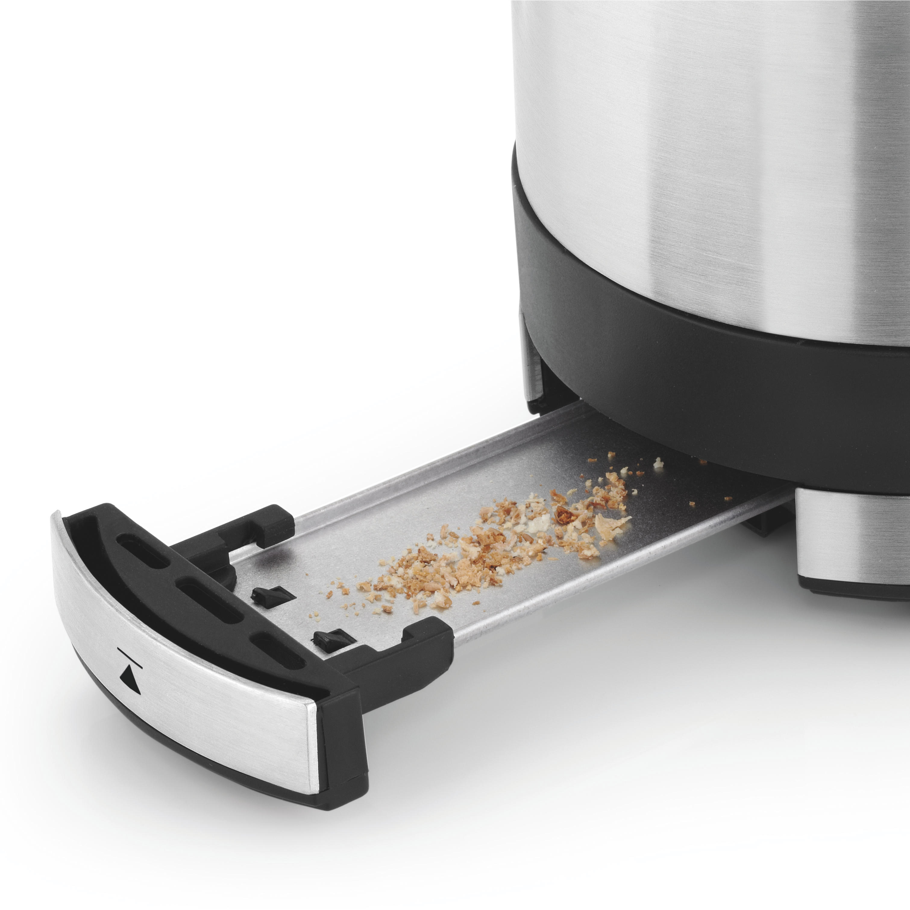 Ein Toaster-Krümelfach mit braunen Krümeln auf Metallschienen.
