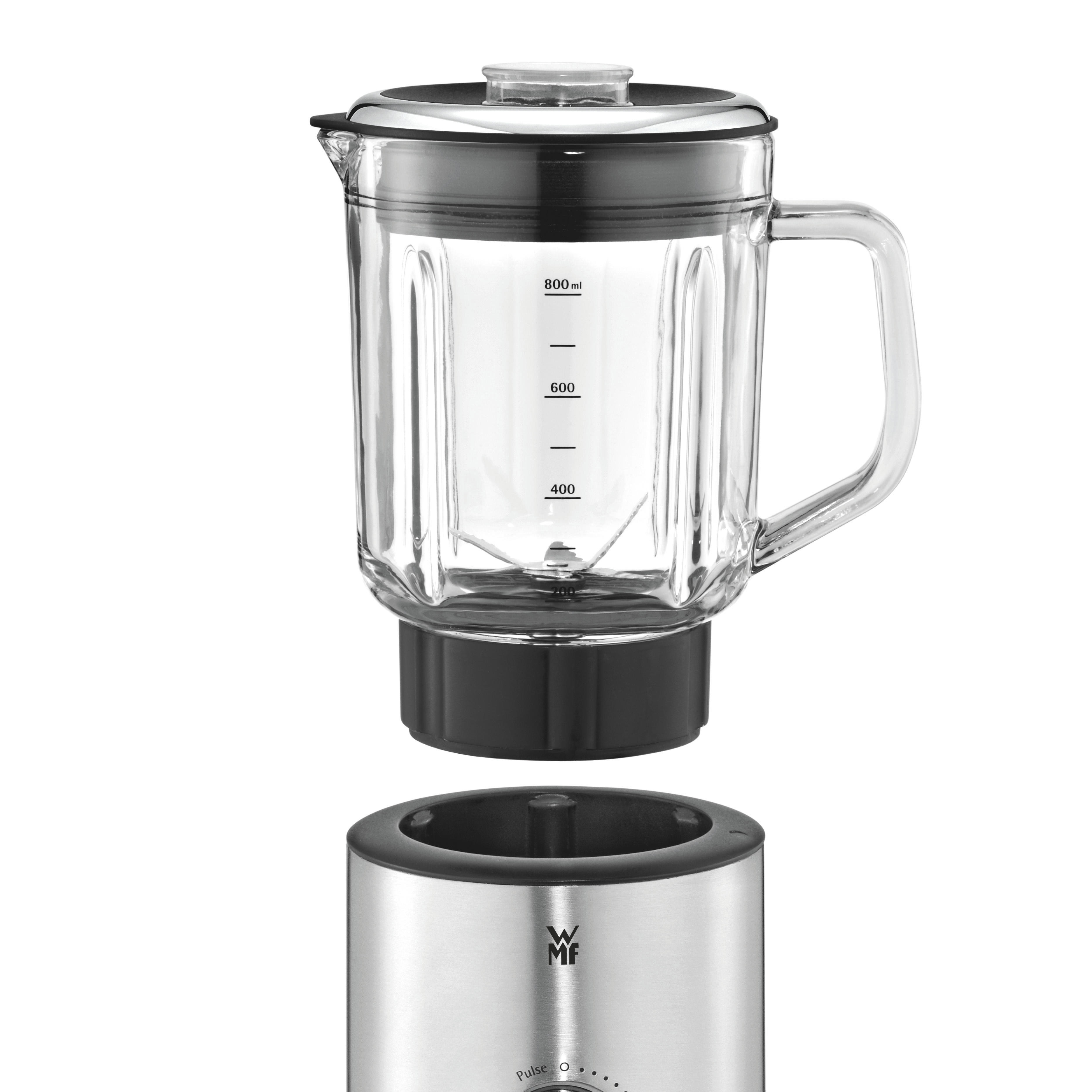 Blender with glass container and a stainless steel base, detached. White background.
