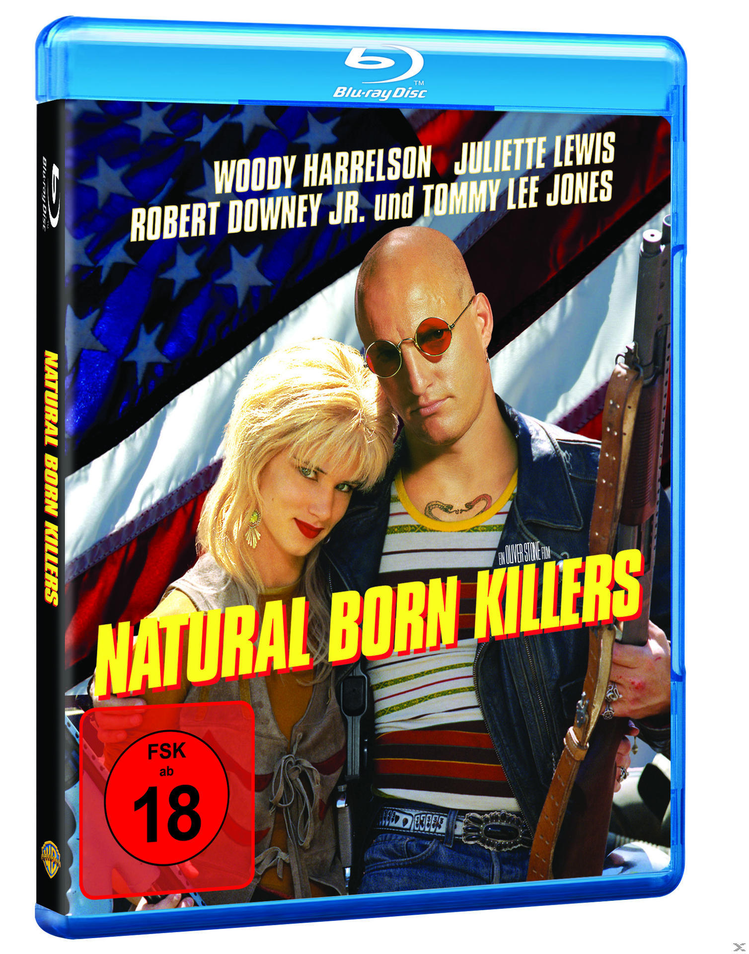 DVD-Cover: 'Natural Born Killers'. Woody Harrelson, Juliette Lewis und eine Waffe, mit amerikanischer Flagge.