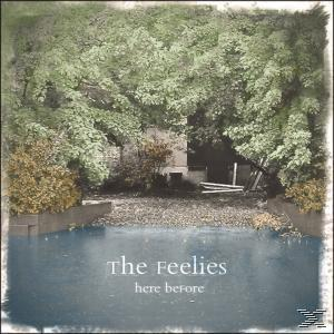 Ein Albumcover mit dem Text 'The Feelies' und 'here before'. Bäume und Wasser füllen das Bild.