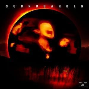 Soundgarden-Albumcover: eine rote Sonne hinter einer dunklen Figur mit verschwommenem Gesicht.