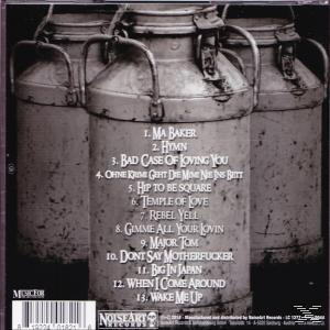 Albumcover mit drei metallenen Milchbehältern. Die Dosen haben die Namen der auf dem Album aufgeführten Songs.