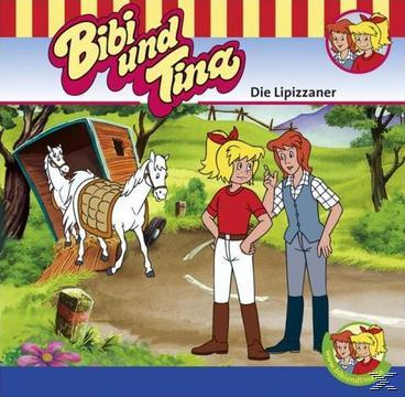 Cartoon-Bild von zwei Mädchen und zwei weißen Pferden, die eine Kutsche ziehen. Der Hintergrund zeigt ein grünes Feld.