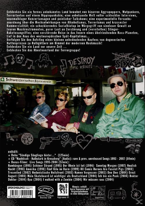 Rückseite einer DVD mit Bandmitgliedern, einer Bühne und Text, der den Inhalt und den Bandnamen detailliert.