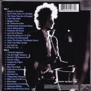 Albumcover mit Bob Dylan auf der Bühne, Textliste links.