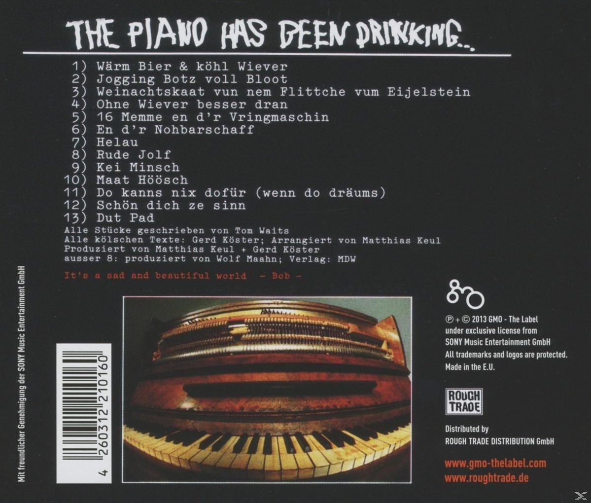 CD-Cover: The piano has been drinking… Text, Klaviertasten und dunkler Hintergrund.