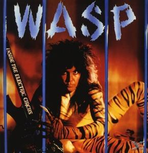 Albumcover. Metal-Band Wasp mit Gitarrist hinter Gittern. Titel: Inside the Electric Circus.