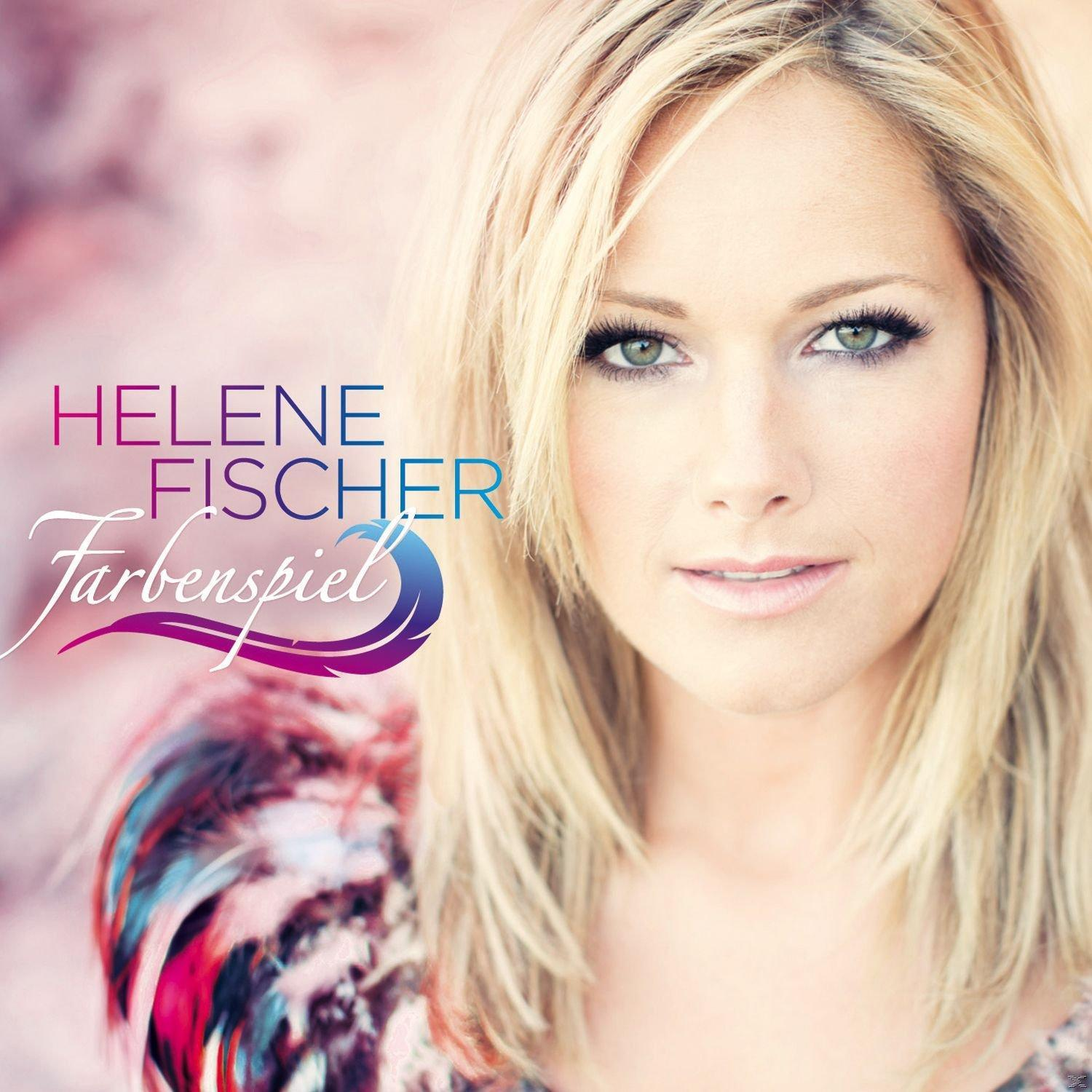 Helene Fischer mit blonden Haaren, die auf einem Albumcover in die Kamera schaut.