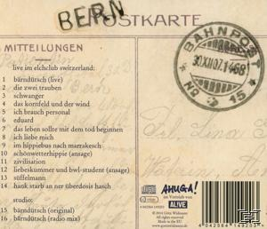 Rückseite einer CD mit handschriftlichem Stil, einer Titelliste und einem Stempel.