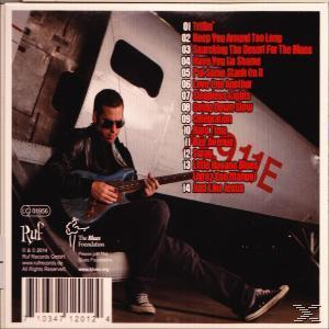 CD-Cover: Mann mit Sonnenbrille, Gitarre und Album-Trackliste.