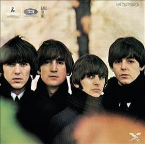 Albumcover: The Beatles vor verschwommenem Hintergrund, dunkle Anzüge und Graustufenfilter.