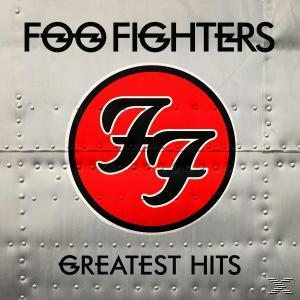 Das Foo Fighters-Albumcover mit Logo und 'Greatest Hits'-Text auf metallischem Hintergrund.