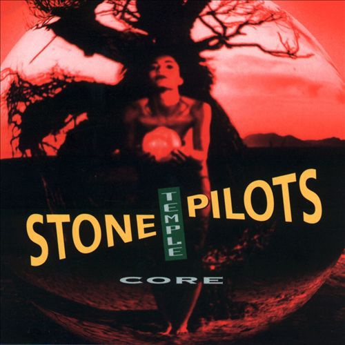 Album borító: Stone Temple Pilots - Core. Egy nő egy ragyogó gömböt tart egy piros-fekete háttér előtt.