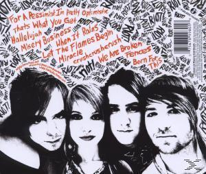 Rückseite des Albumcovers, Riot-Bandmitglieder in einer Gruppe, umgeben von Songtiteln und Wörtern.