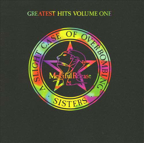 Album borító: Fekete háttér, színes logó és egy csillag. Cím: Greatest Hits.