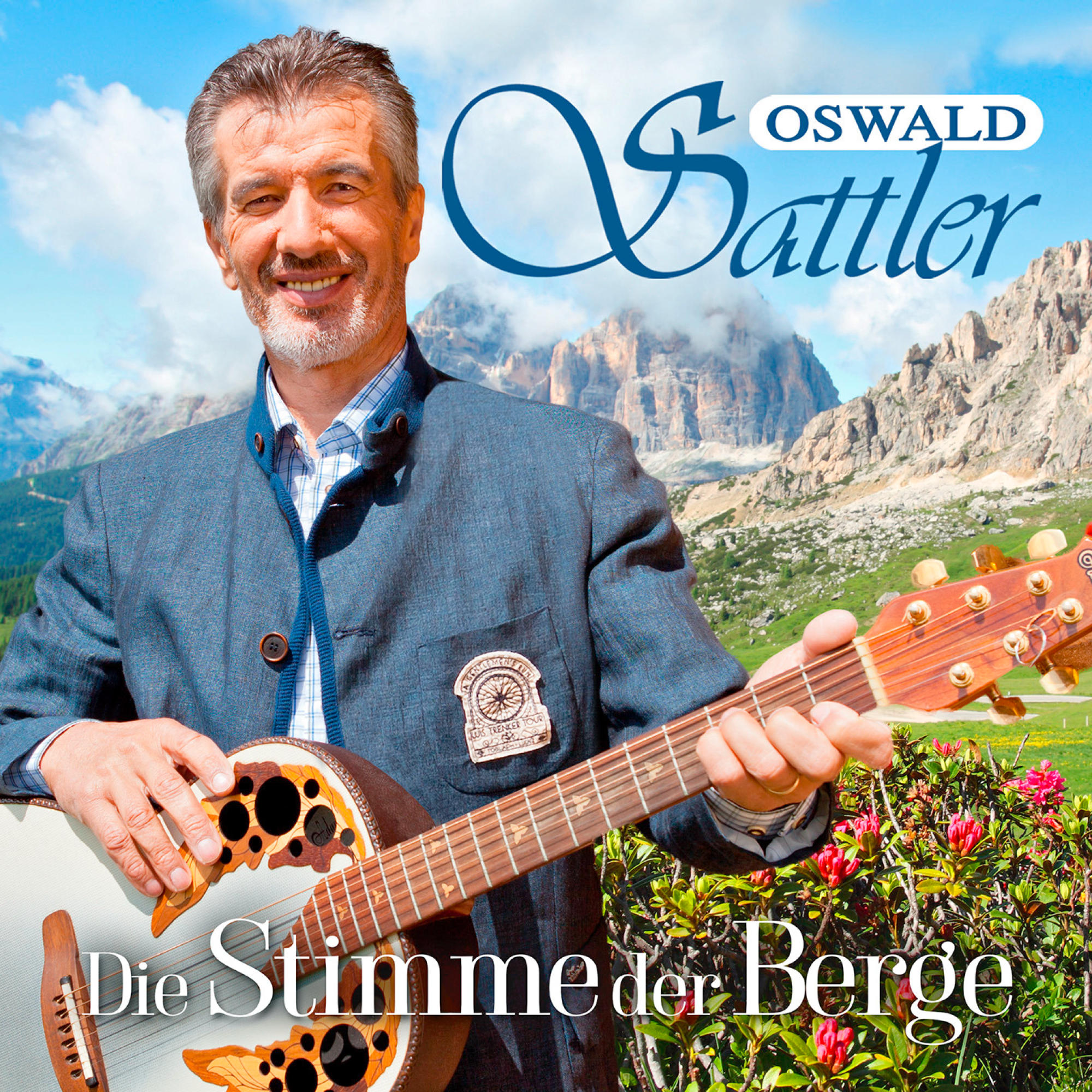 Albumcover mit einem lächelnden Mann, der eine Gitarre vor einem Bergpanorama hält. Titel: Oswald Sattler.