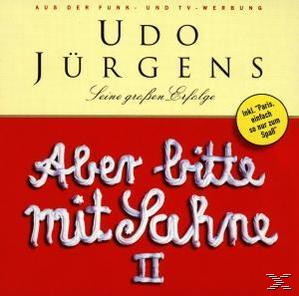 Albumcover. Udo Jürgens, Text 'Aber Bitte mit Sahne II' auf rotem Hintergrund mit gelbem Kreis.