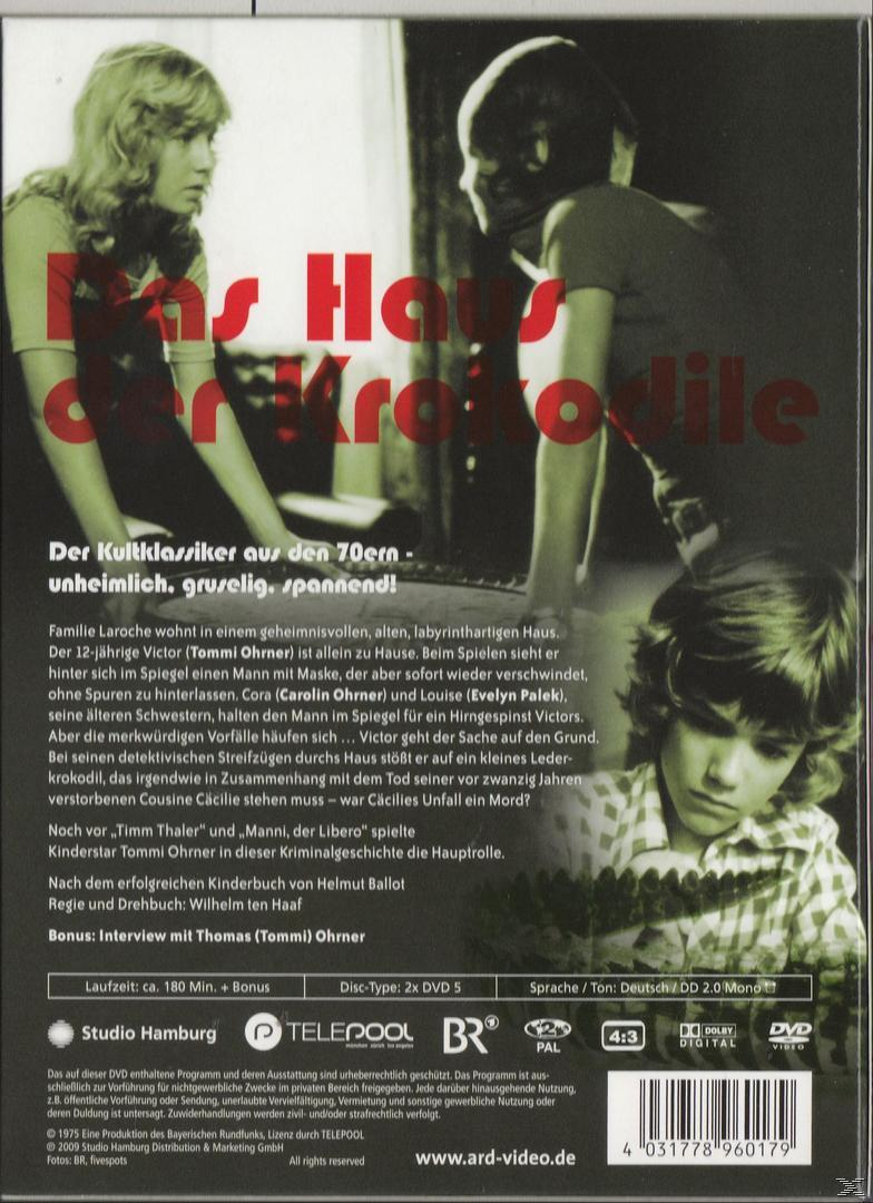 DVD-Cover, Schwarz-Weiß-Foto eines Hauses mit zwei Figuren. Titel: 'Das Haus der Krokodile'.