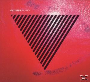 Albumcover: Ein roter Hintergrund mit einem schwarz-weiß gestreiften Dreieck.
