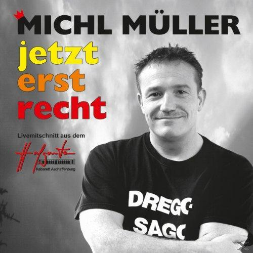 CD-Cover: Ein Mann mit schwarzem Hemd und verschränkten Armen. Text: Michl Müller, Jetzt erst recht.