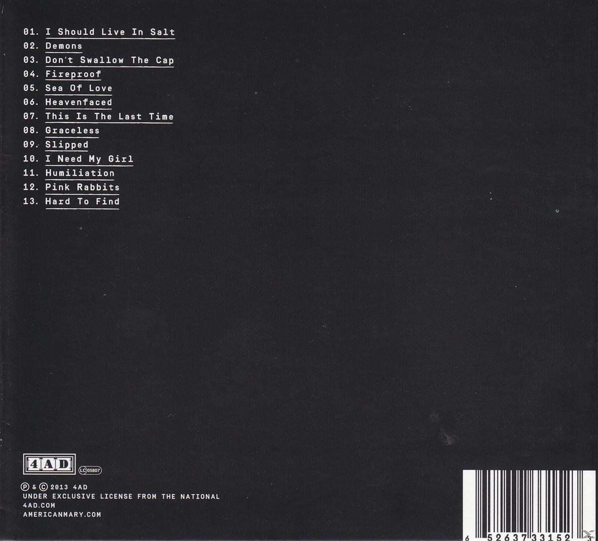 Rückseite eines CD-Case mit Titelliste, schwarzem Hintergrund und Barcode.