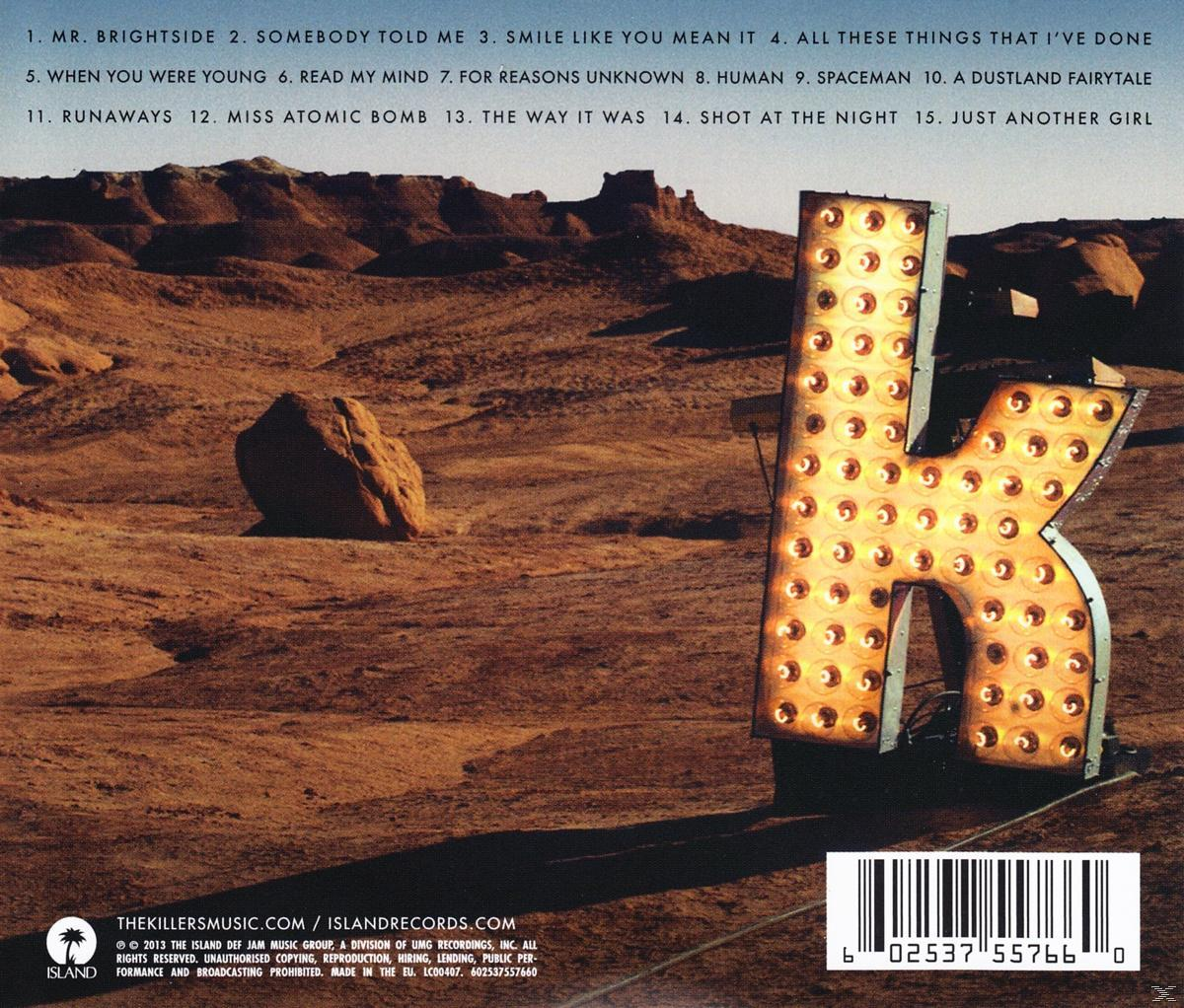 Albumhoes met een grote K van lichten in een woestijn. Songlijst en credits staan ​​vermeld.