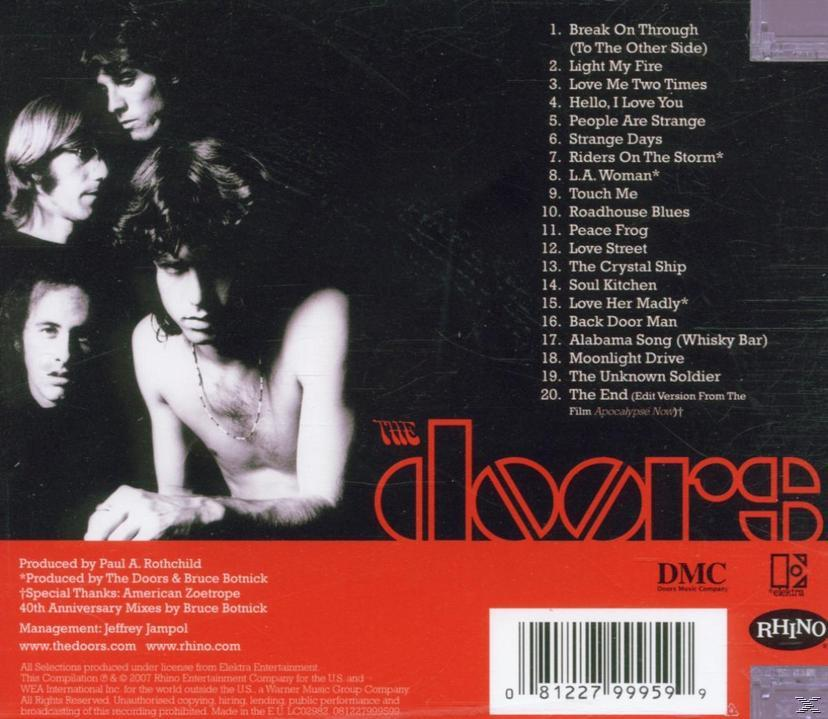 Albumcover mit einer Band und Text. Der Bandname ist rot, und die Songliste steht unten.