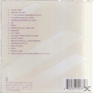Albumrückseite mit Titelliste und Credits. Weißer Hintergrund mit lila Text und Barcode unten.