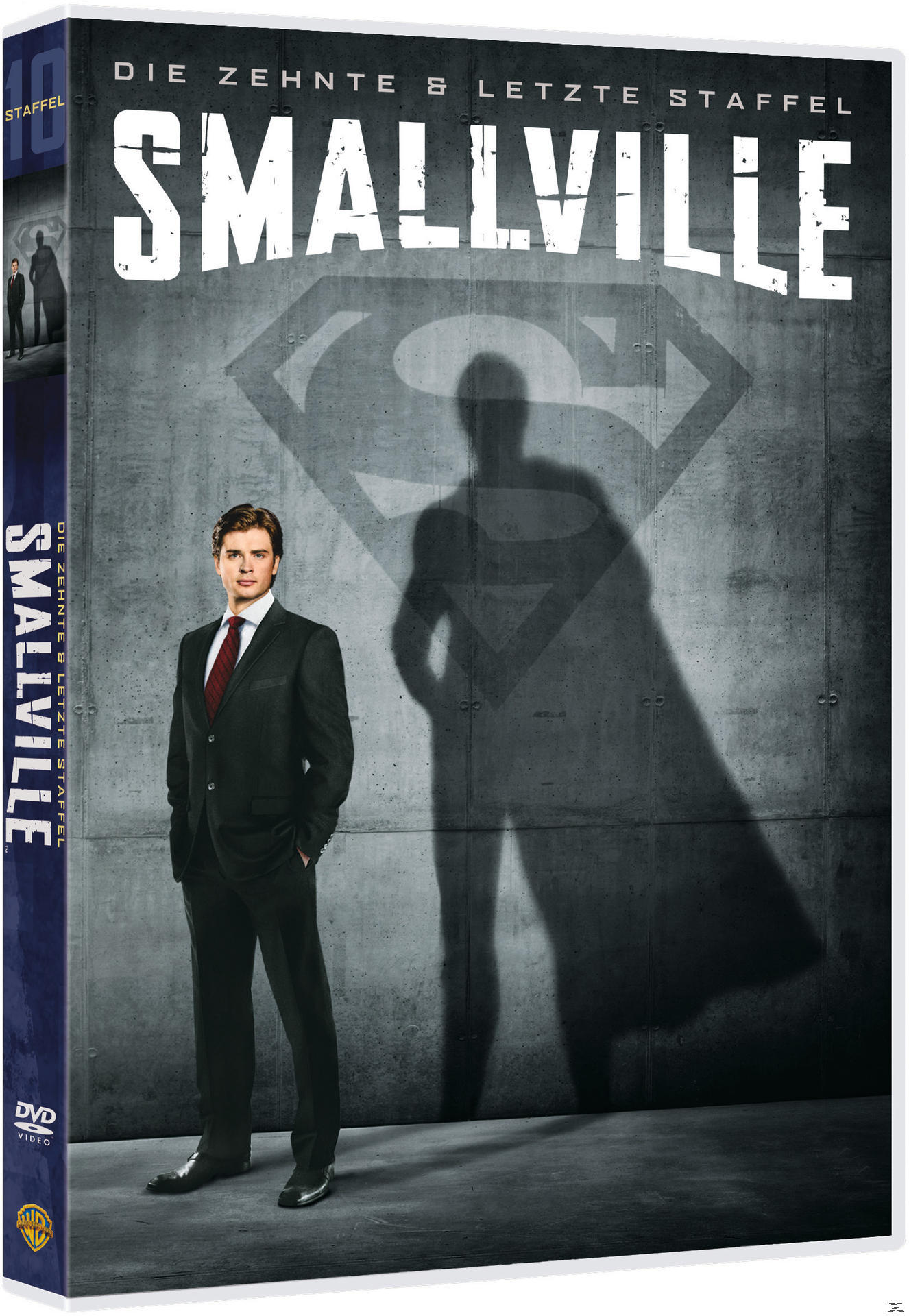 DVD-Cover: Smallville, 10. und letzte Staffel. Clark Kent im Anzug mit Superman-Schatten.