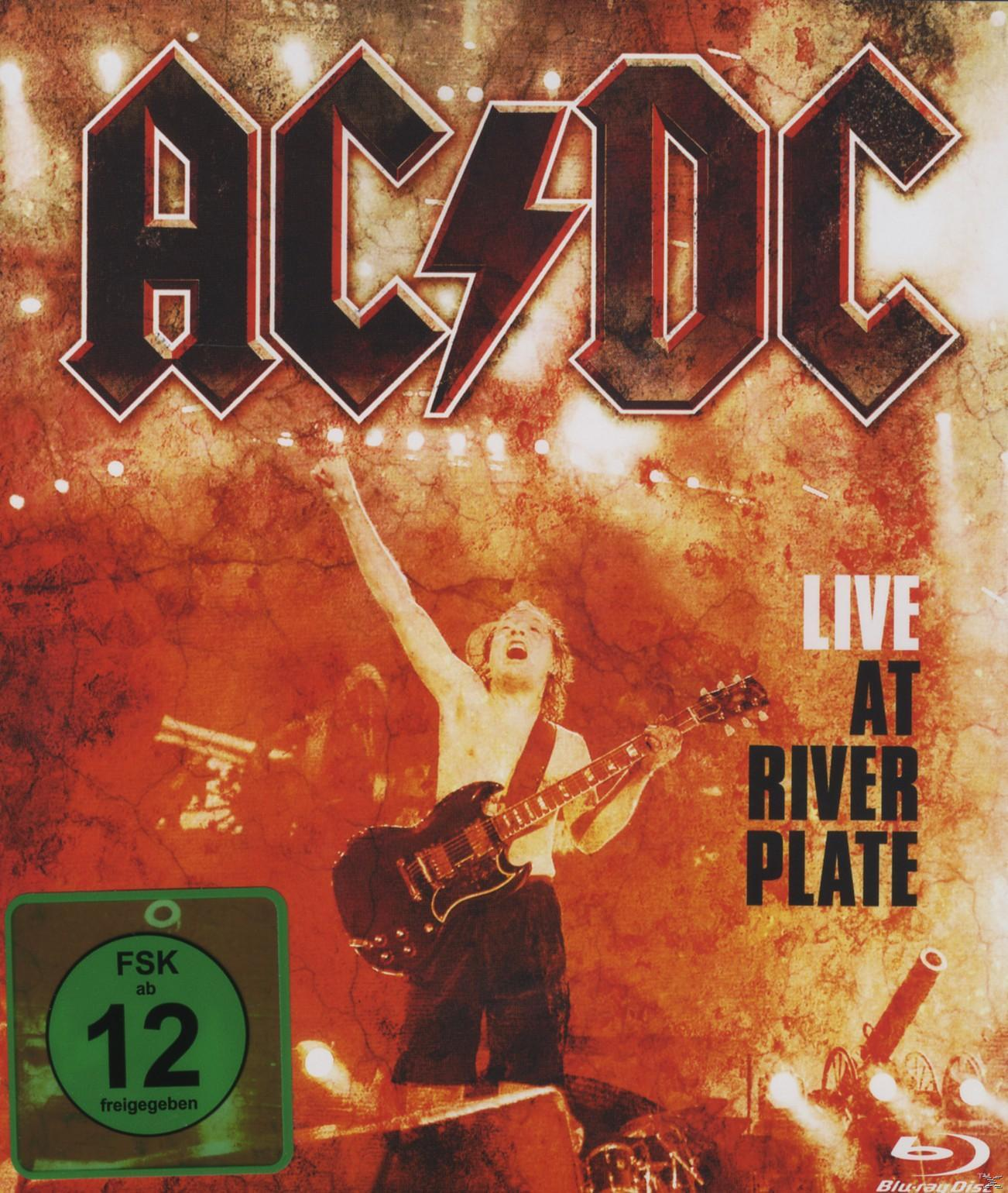 AC/DC Live at River Plate Albumcover mit einem Mann, der Gitarre spielt. Der Hintergrund ist rot.