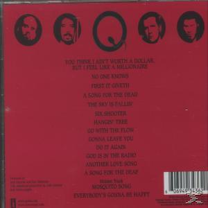 CD-borító piros háttérrel és dalfelsorolással. Felül arcok láthatók.