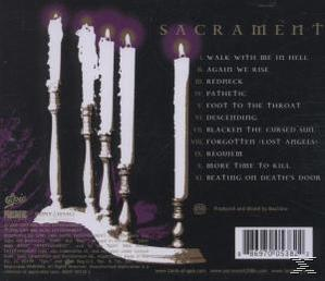 CD-Cover mit Kerzen und Songtiteln in Weiß, mit lila Hintergrund.