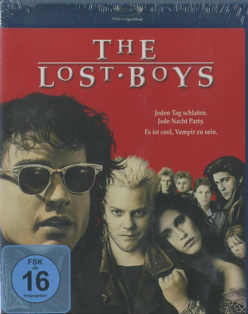 DVD-Cover von The Lost Boys, mit einer Gruppe von Leuten, mit Text oben.