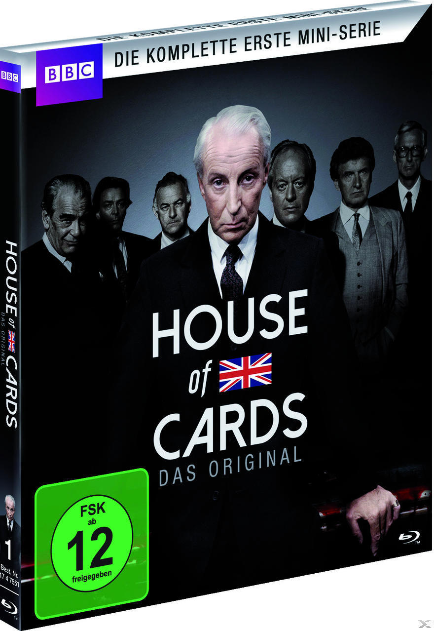 DVD-Cover. Eine Gruppe von Männern in Anzügen, mit dem Titel der Serie und einer Union Jack.